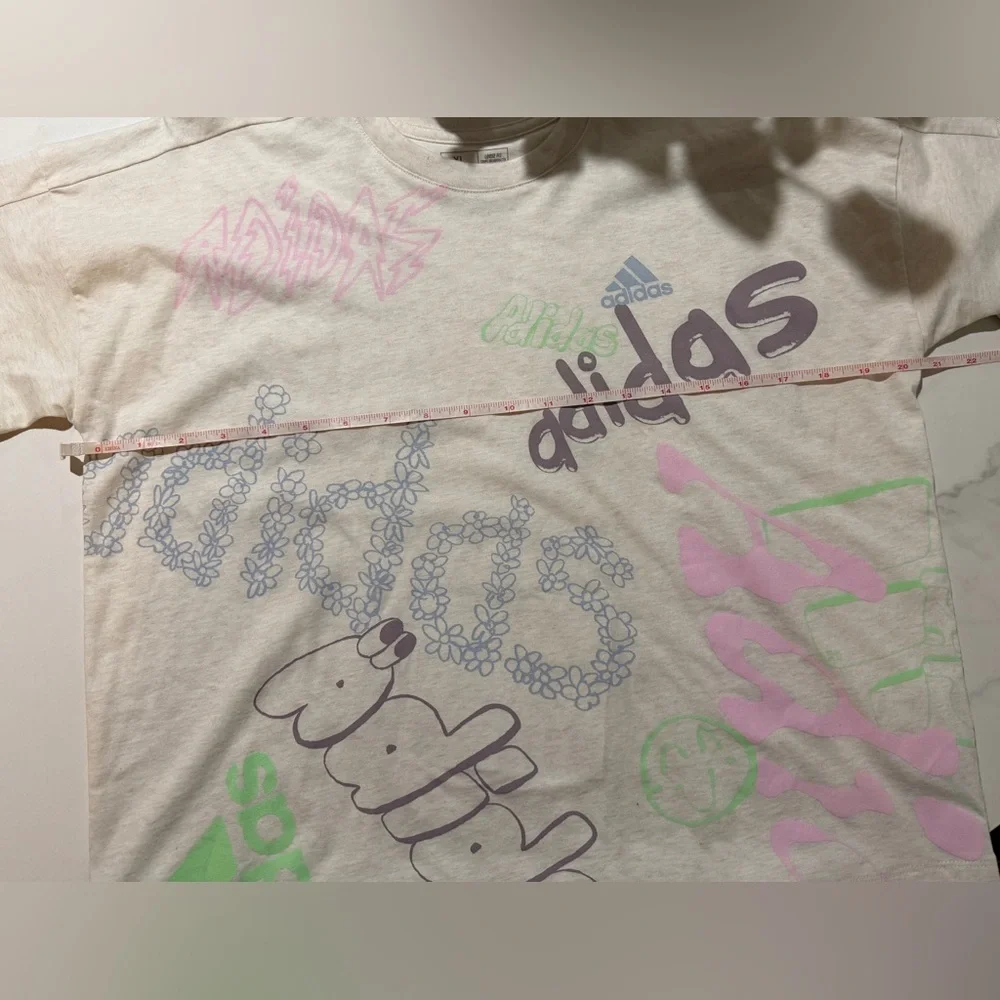 adidas Cream Short-Sleeve Graphic Tee with Pastel Accents